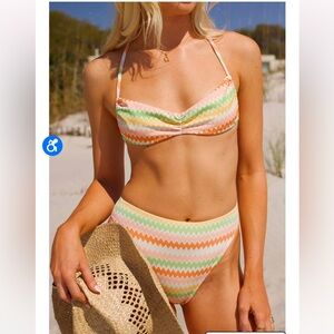 Dipping Daisy’s bikini bottom